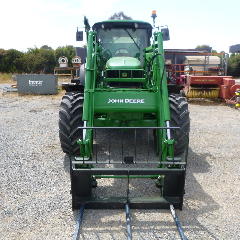 Used John Deere 6520 Cab tractor with front end loader