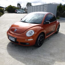 USED 2010 VOLKSWAGEN BEETLE BLACK ORANGE EDITION