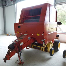 USED NEW HOLLAND 654 ROUND BALER