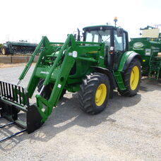 Used John Deere 6520 Cab tractor with front end loader