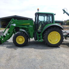 Used John Deere 6520 Cab tractor with front end loader