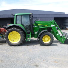 Used John Deere 6520 Cab tractor with front end loader