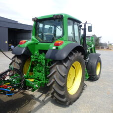 Used John Deere 6520 Cab tractor with front end loader