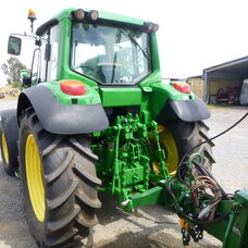 Used John Deere 6520 Cab tractor with front end loader