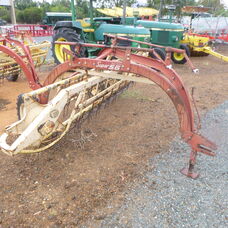 Used New Holland Super 56 roller bar rake
