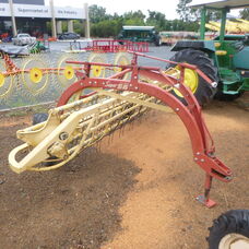 Used New Holland Super 56 roller bar rake