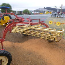 Used New Holland Super 56 roller bar rake