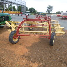 Used New Holland Super 56 roller bar rake